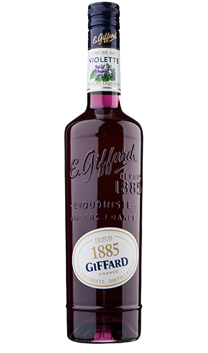 Bottle of Giffard Creme de Violette 750 ML with violet flowers and a cocktail glass