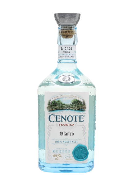 Bottle of Cenote Tequila Blanco 750 ML with agave plant and a cocktail glass