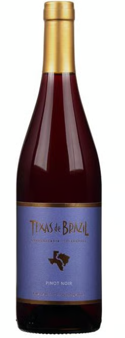 Texas de Brazil Pinot Noir 750 ML bottle with red wine and elegant label on wooden surface