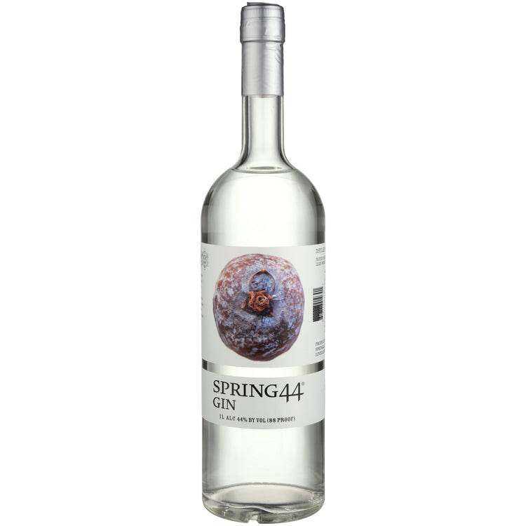 Spring 44 Dry Gin 88 1L bottle with clear liquid and detailed label featuring a juniper berry design.