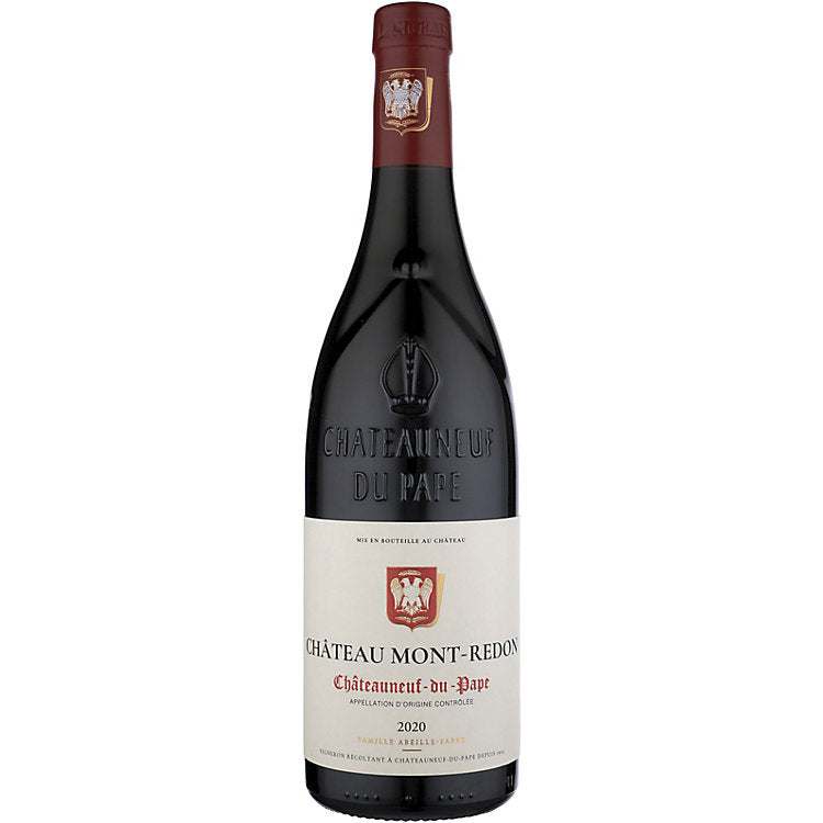Bottle of Chateau Mont Redon Chateauneuf Du Pape 2020 750 ML red wine with vineyard background