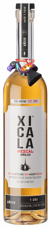 Xicala Mezcal bottle with colorful label on a white background