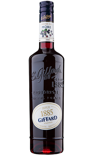 Bottle of Giffard Creme de Mure 750 ML with fresh blackberries and a cocktail glass