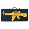Casino Azul Gold Rifle Añejo tequila in a gold rifle-shaped bottle with black case