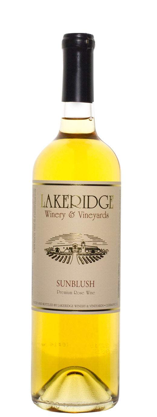 Lakeridge Winery & Vineyards Sunblush Muscadine wine bottle 750ml against Florida sunset colors
