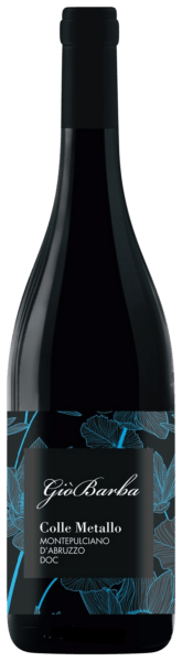 Wine bottle with label featuring floral design and brand name on a black background