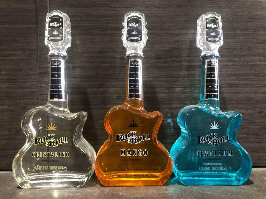 Rock N Roll Tequila Combo 750 ML bottles in guitar-shaped glass, featuring Platinum, Cristalino, and Mango flavors.