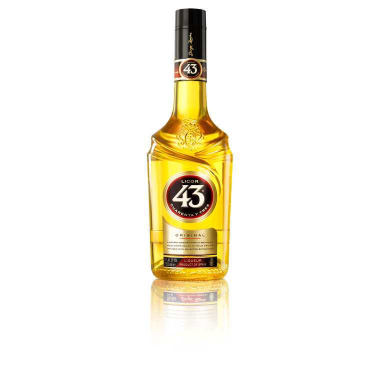 Licor 43 Herbal Liqueur 750ml bottle with golden glow and Mediterranean design.