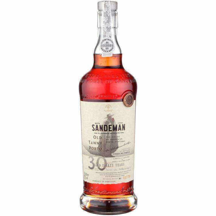 Sandeman Porto Tawny 30 Year aged in wooden casks with amber hue.