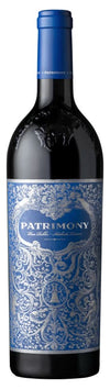 Patrimony Cabernet Sauvignon 2021 bottle with blue ornate label and deep red wine inside