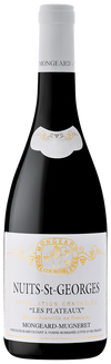 Bottle of Nuits-St-Georges wine with a white label on a black background